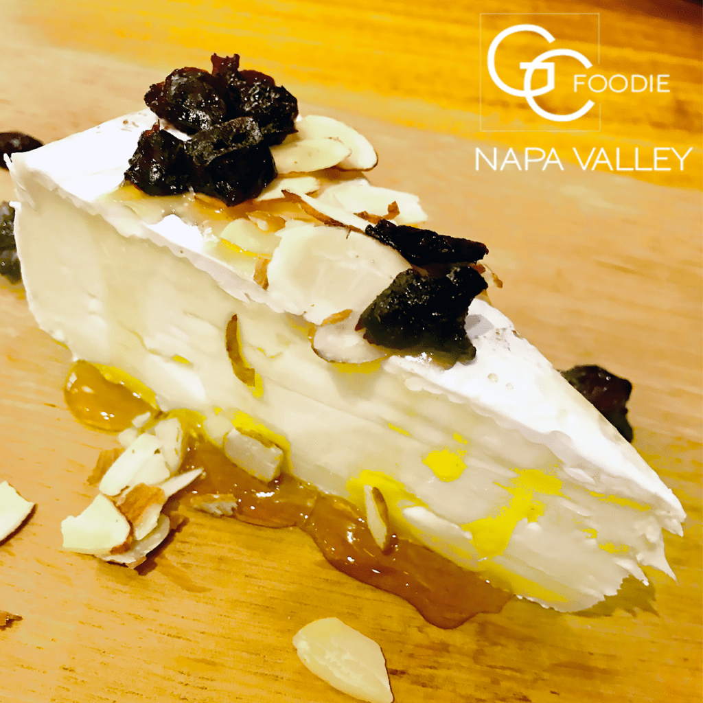 Creamy Brie with Apple Guava Honey and Drunken Cranberries - O'Connell Family Wines