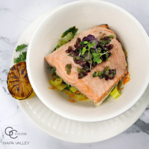 Succulent Olive Oil Poached Salmon with Kalamata Caper Relish and Charred Lemon